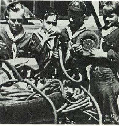 Cub Scouts assisting in a wartime scrap drive.      Click for Larger Image
